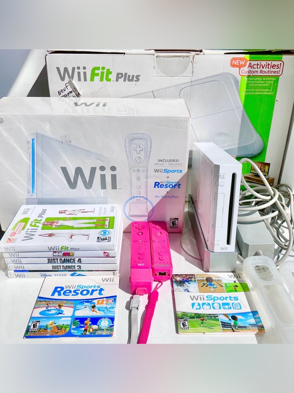 Nintendo Wii Console Bundle with Pink Motion Controllers and Games - sports